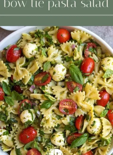 Colorful Bow Tie Pasta Salad with fresh vegetables and dressing