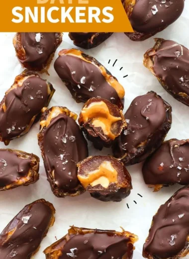 Homemade Date Snickers bars made with dates, nuts, and chocolate