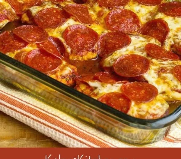 Low-Carb Pepperoni Pizza Chicken Bake topped with cheese and pepperoni slices