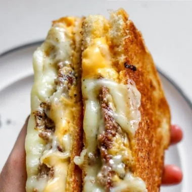 Smashburger grilled cheese sandwich with special sauce and melted cheese