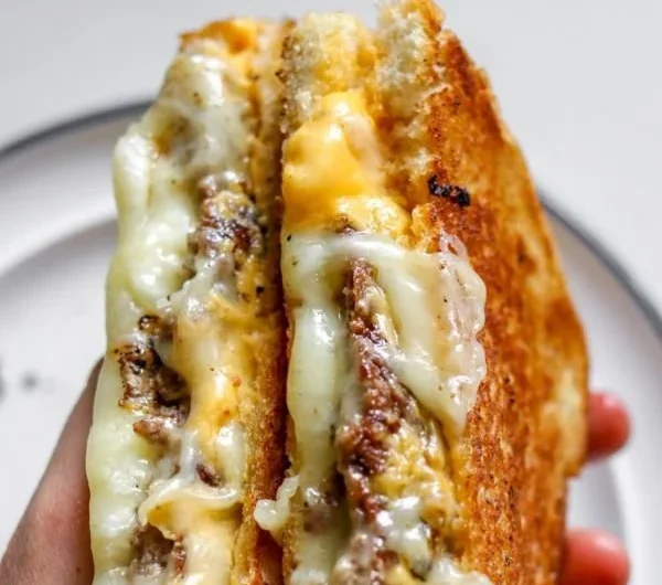 Smashburger grilled cheese sandwich with special sauce and melted cheese