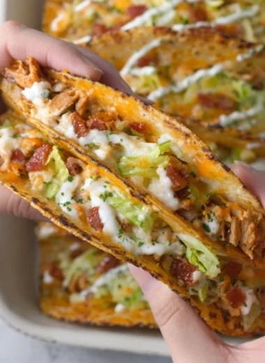 Cheesy oven-crispy chicken bacon ranch tacos on a plate
