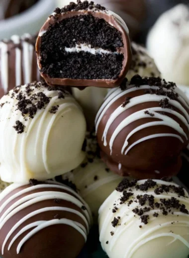 Delicious homemade Oreo truffles coated in chocolate and topped with crushed Oreos