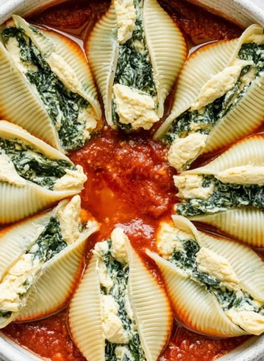 Plate of vegan stuffed shells filled with plant-based ingredients