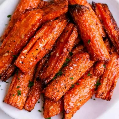 Air fryer carrots served with honey garlic butter in a bowl