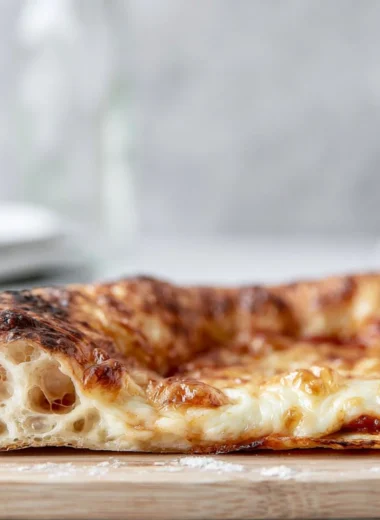 Delicious artisan pizza topped with fresh ingredients and baked to perfection.