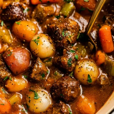 Delicious beef stew with tender meat and vegetables served in a bowl