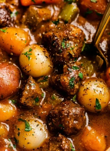Delicious beef stew with tender meat and vegetables served in a bowl