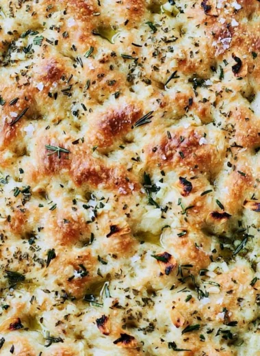 Freshly baked garlic rosemary focaccia bread with a golden crust