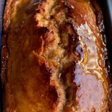 Delicious slice of cozy sourdough banana bread made with sourdough discard.