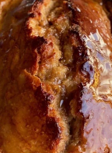 Delicious slice of cozy sourdough banana bread made with sourdough discard.