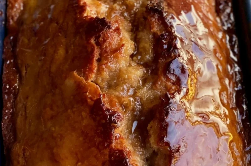 Delicious slice of cozy sourdough banana bread made with sourdough discard.