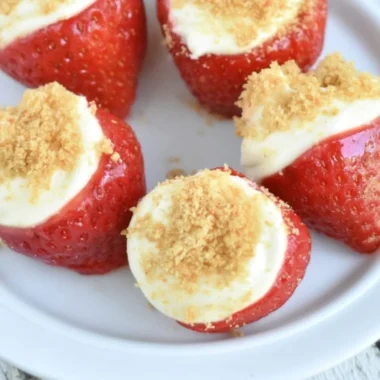 Easy no-bake strawberry cheesecake bites topped with fresh strawberries