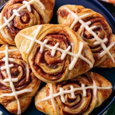 Football-shaped cinnamon rolls fresh out of the oven, perfect for game day.