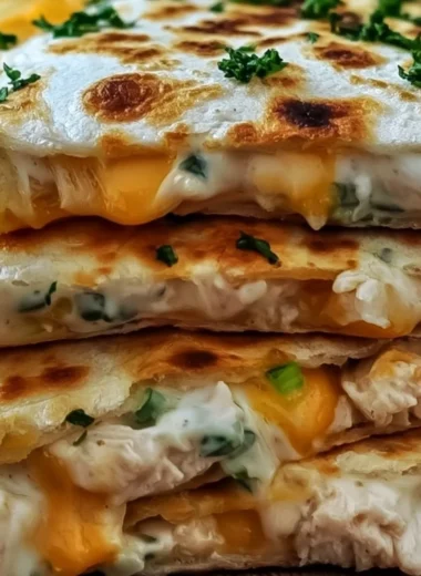 High-protein chicken ranch quesadilla with melted cheese and fresh toppings