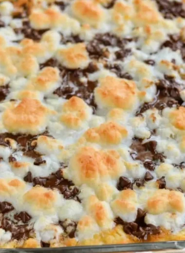 Delicious S'mores Magic Bars with graham crackers, chocolate, and marshmallows