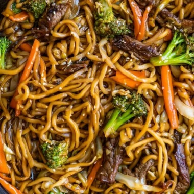 Bowl of cozy Beef Lo Mein with tender beef and vegetables.