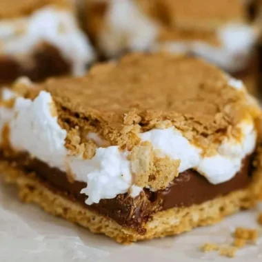 Delicious cozy S'mores Bars with chocolate and marshmallows