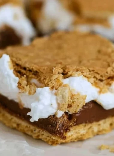 Delicious cozy S'mores Bars with chocolate and marshmallows