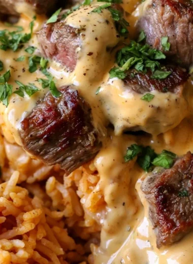 Delicious steak queso rice served in a bowl for a cozy Tex-Mex night