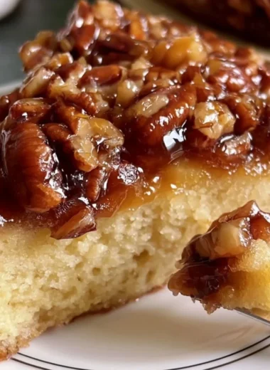 Upside Down Caramel Pecan Cake topped with rich caramel and pecans.